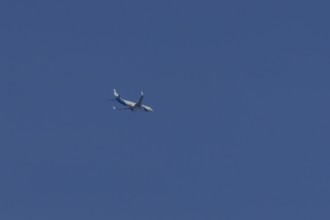 Boeing 737 jet passenger aircraft of El Al Israel airlines flying in a blue sky, England, United