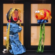 Homemade lanterns for the Martin procession in front of a window in the evening, Old Town, Kempen,