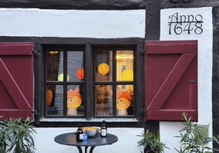 Half-timbered house in the Tiefstraße decorated for the Martin train, Altstadt, Kempen, Lower