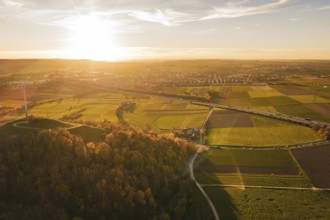 Extensive fields and forests under a wide sky at sunset, Grüner Heiner, Korntal, Germany