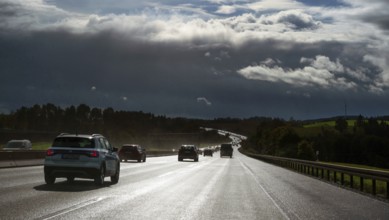 Cars on rain-wet A9 motorway during a thunderstorm, Hof, Upper Franconia, Bavaria, Germany