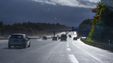 Cars on rain-wet A9 motorway during a thunderstorm, Hof, Upper Franconia, Bavaria, Germany