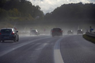 Tourist traffic on the A9 motorway during thunderstorms, Bavarian Forest, Bavaria, Germany