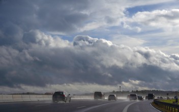 Tourist traffic on the A9 motorway during thunderstorms, Bavarian Forest, Bavaria, Germany