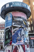 Advertising column for cultural projects, advertising for events, unkempt, torn and exfoliated