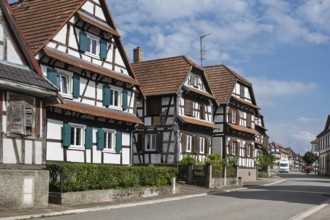 Street with traditional half-timbered houses, Betschdorf pottery village, Alsace, France