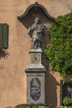 Slulptur of Saint Nepomuk with canopy, Going am Wilden Kaiser, Tyrol, Austria