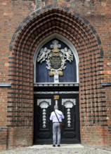 Portal of St. Nicholas Church, important building of North German brick Gothic and part of the