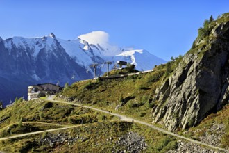 Mountain station of the La Flégère cable car, with the snow-covered Mont Blanc massif at the back,