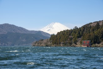 View of Lake Ashi with Mount Fuji volcano and peace torii from Hakone Shrine, Hakone, Japan