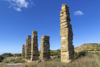 Stone columns of ancient aqueduct, Roman site of Los Banales, near Layana, Zaragoza province,