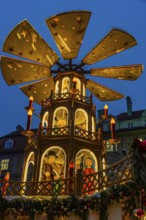 Christmas market with three-story illuminated Christmas pyramid, Rindermarkt, Munich, Upper