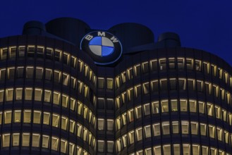 Illuminated offices at BMW headquarters, BMW four-cylinder, Petuelring, Munich, Upper Bavaria,
