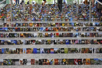 People walking on a staircase with covered photos, Photokina 2012, Messeplatz 1, Cologne, North