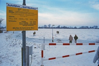 People walk across ice rink, ferry dock, frozen Elbe, Bleckede, Lower Saxony, Germany, January 03,