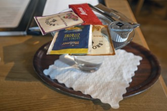 Selection of fruit teas served with a hot glass of water, Franconia, Bavaria, Germany