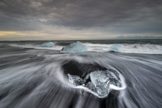 Beach with waves, ice formations, Diamont Beach, Jökulsarlon, Iceland