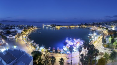 Aerial view, night view, Mandraki harbor, seaport, harbor promenade, ship, ships, illuminated, back
