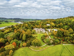 Autumn colours over Bodnant House and Garden from a drone, Conwy River, Colwyn Bay, Conwy, Wales,