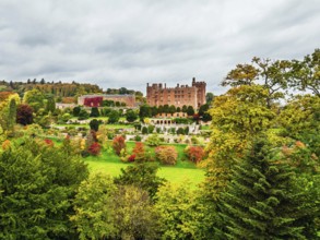 Autumn colours over Powis Castle and Garden from drone, Welshpool, Powys, Wales, England, United