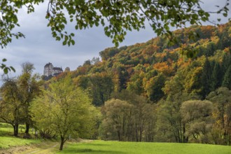 Mixed autumn forest, Egloffstein Castle on the left, Egloffstein, Franconian Switzerland, Upper