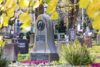 Honorary grave of poet Eduard Mörike. Pragfriedhof Stuttgart in autumn. November is traditionally a