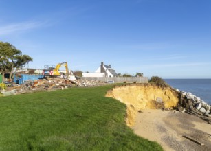 Demolition of Jean Flick's house, The Warren, Thorpeness, Suffolk, England, UK due to rapid coastal