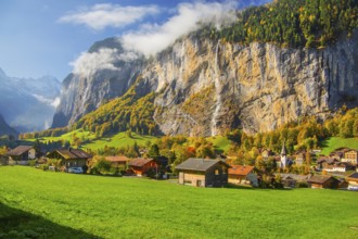 View of town and valley with Staubbach waterfall in autumn, Lauterbrunnen, Bernese Oberland, Canton