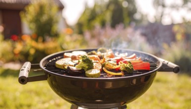 Cooking vegetables on grill outdoors, healthy lifestyle with healthy food, close up of grill with