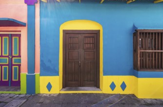 Colorful colonial architecture of historic center of Flores, Guatemala