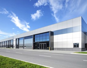 Modern supermarket building exterior against blue sky, Inviting white facade, some clouds, concept