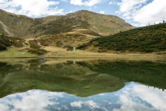 Schlappoldkopf and Söllerkopf are reflected in Schlappoldsee, Fellhorn, Oberstdorf, Oberallgäu,