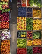 Fresh fruits and vegetables in a market display, aerial view perpendicular top down, healthy eating