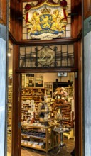 The Posthumus Shop, stationery boutique, shop façade with decorative stamp motifs, St. Luciensteeg,