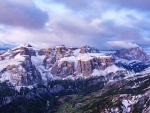 Sella group with fresh snow above the green Val Badia valley, Langkofel on the right, Dolomites,
