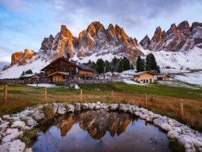 Geisleralm with Geisler Group in Alpenglühen, reflection, Dolomites, Santa Magdalena, Trentino,