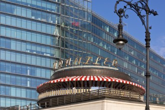 Café Kranzler with historic lantern and modern office building on Kurfürstendamm, Charlottenburg,