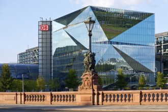 Historic Moltkebrücke with modern Cube Berlin, cube-shaped office building with glass façade