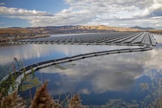 Park City, Utah - Floating solar panels provide power for Mountain Regional Water. The solar array