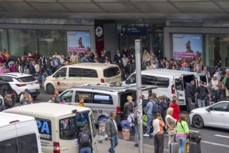 Ahead of Terminal B, many thousands of people set off on holiday on the first day of the North