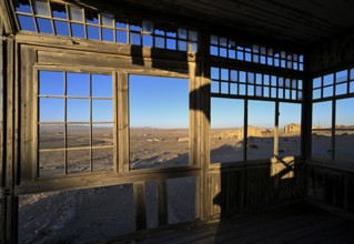 View from a former dwelling house into the desert, Kolmanskop, restricted diamond area, Karas