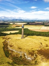 Waterloo Monument over Scottish fields and farms from a drone, Jedburgh, Scotland, UK