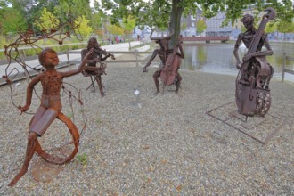 Sculpture The Concert by Günther Fahrner, rusty, metal sculpture, sheet metal, modern art, four