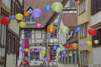 Houses in the Marktgasse with colourful lanterns, decoration, balloons, idyll, inscription,