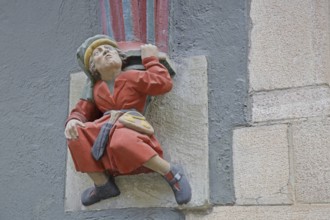 Figure under a bay window, detail, supporting, carrying, kneeling, sculpture, Kirchgasse, Tübingen,