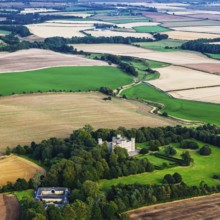 Wedderburn Castle and Barns over fields from a drone, Duns, Berwickshire, Scotland, UK