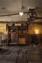 Factory hall with historical machines for the production of cardboard and paper, former paper