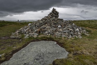 Stones deposited by pilgrims, stone pyramid, Allmannrøysa, Olav's Way or Olavsleden, old Kongevegen