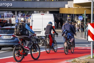 Cycle path, cycle lane, marked in red to draw the attention of motorists to the cycle path, between