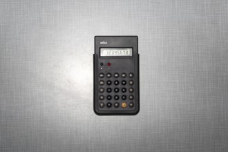 Top Shot, replica ET66 pocket calculator from Braun, designed by Dieter Rams